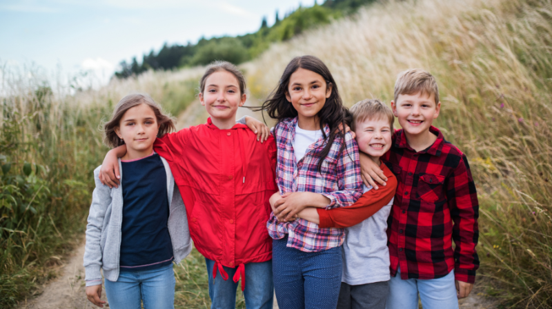 Children standing together outside