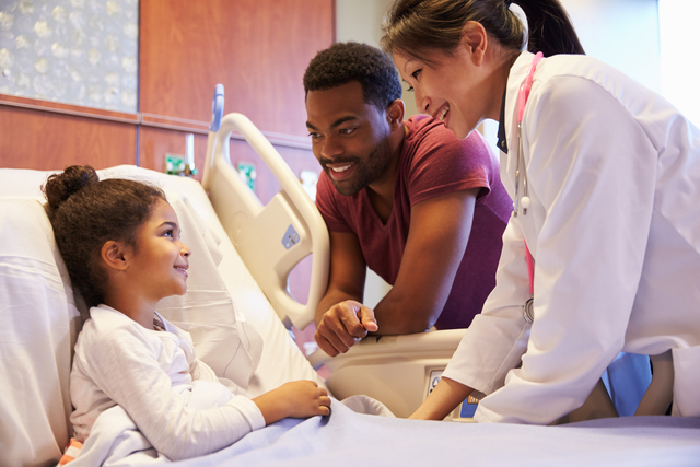 Doctor, child and parent