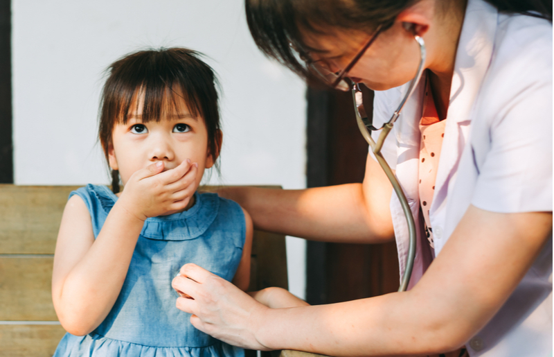 sick child with doctor