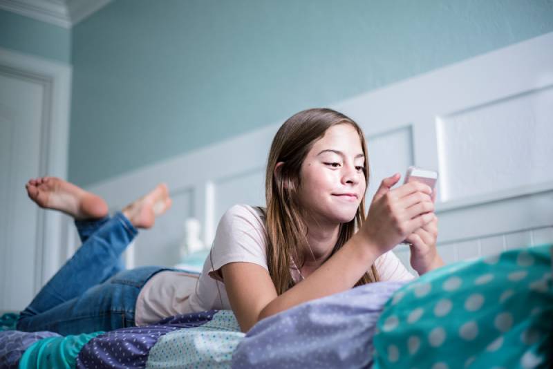 child on mobile device