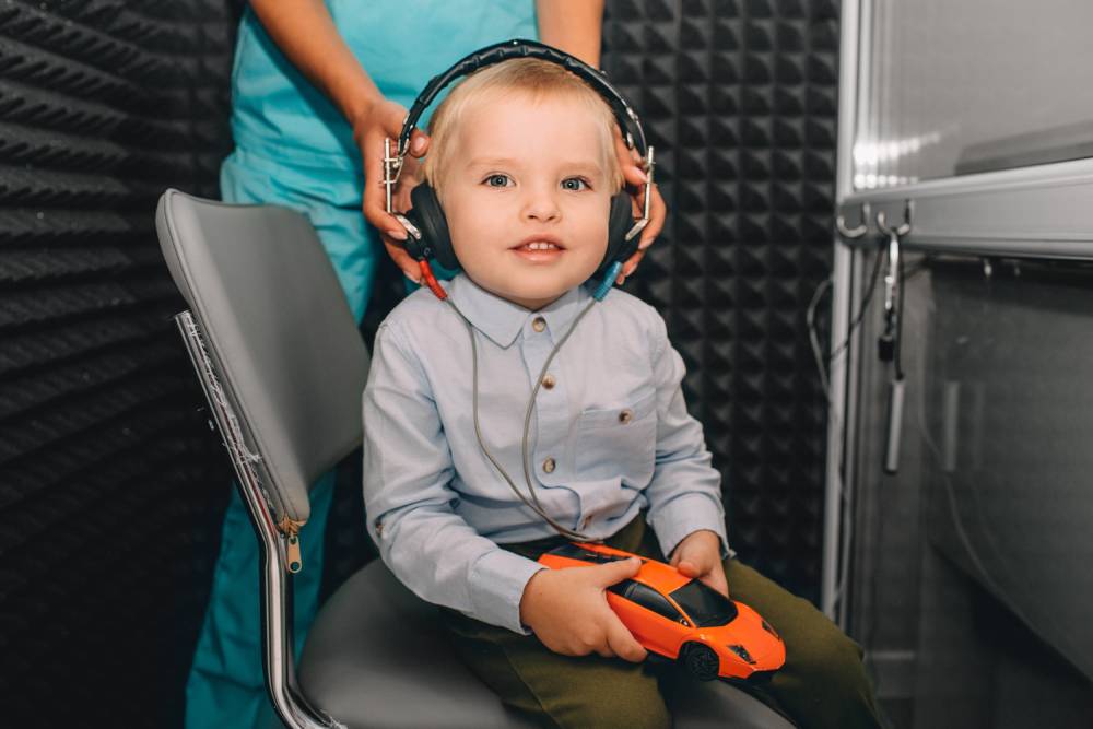 child getting hearing test