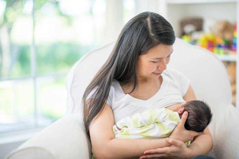 mother breastfeeding baby